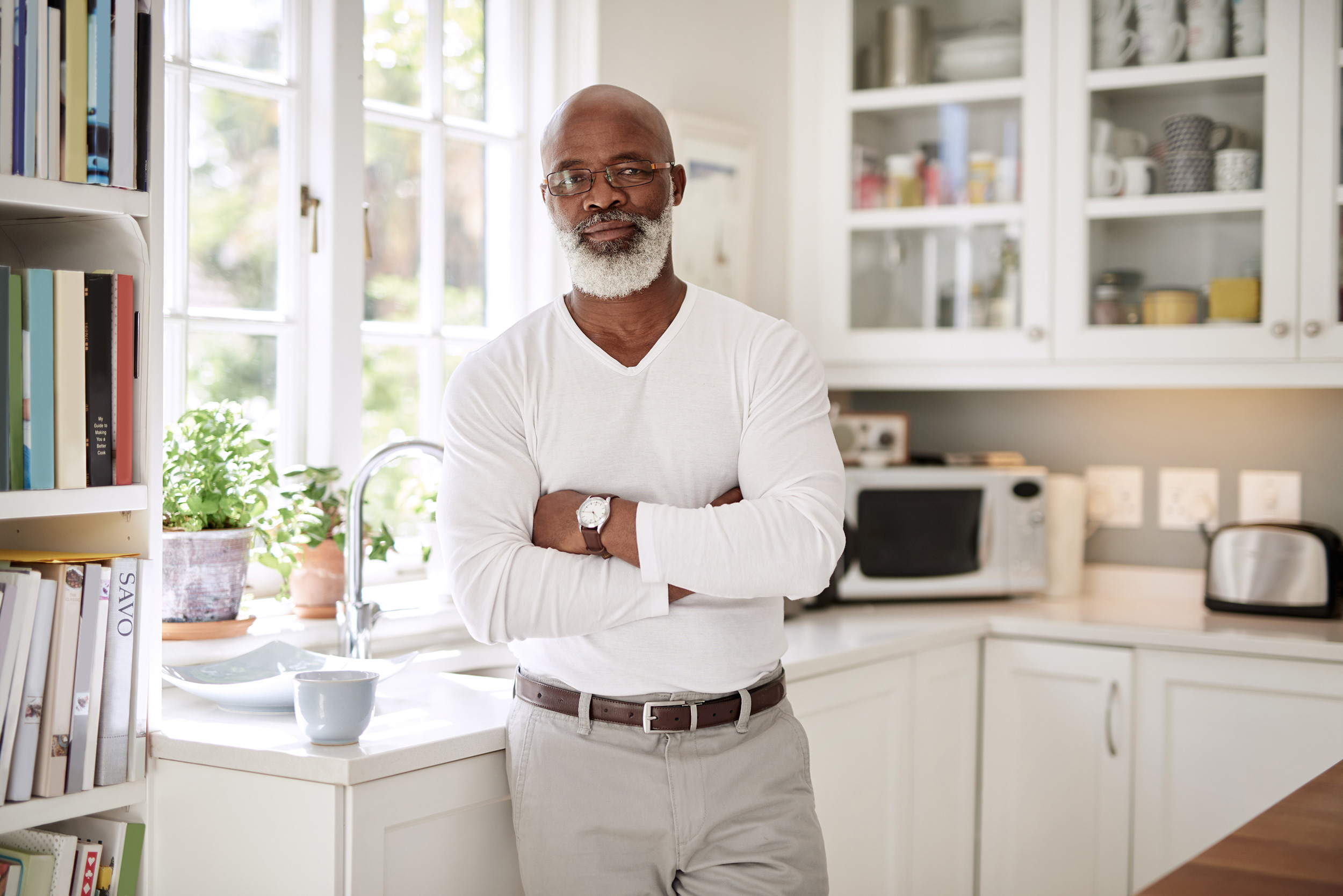 Folding his arms and standing in a kitchen, a man looks straight ahead. Social Security uses a measure of your abilities called "residual functional capacity" in deciding whether you should be awarded disability benefits.