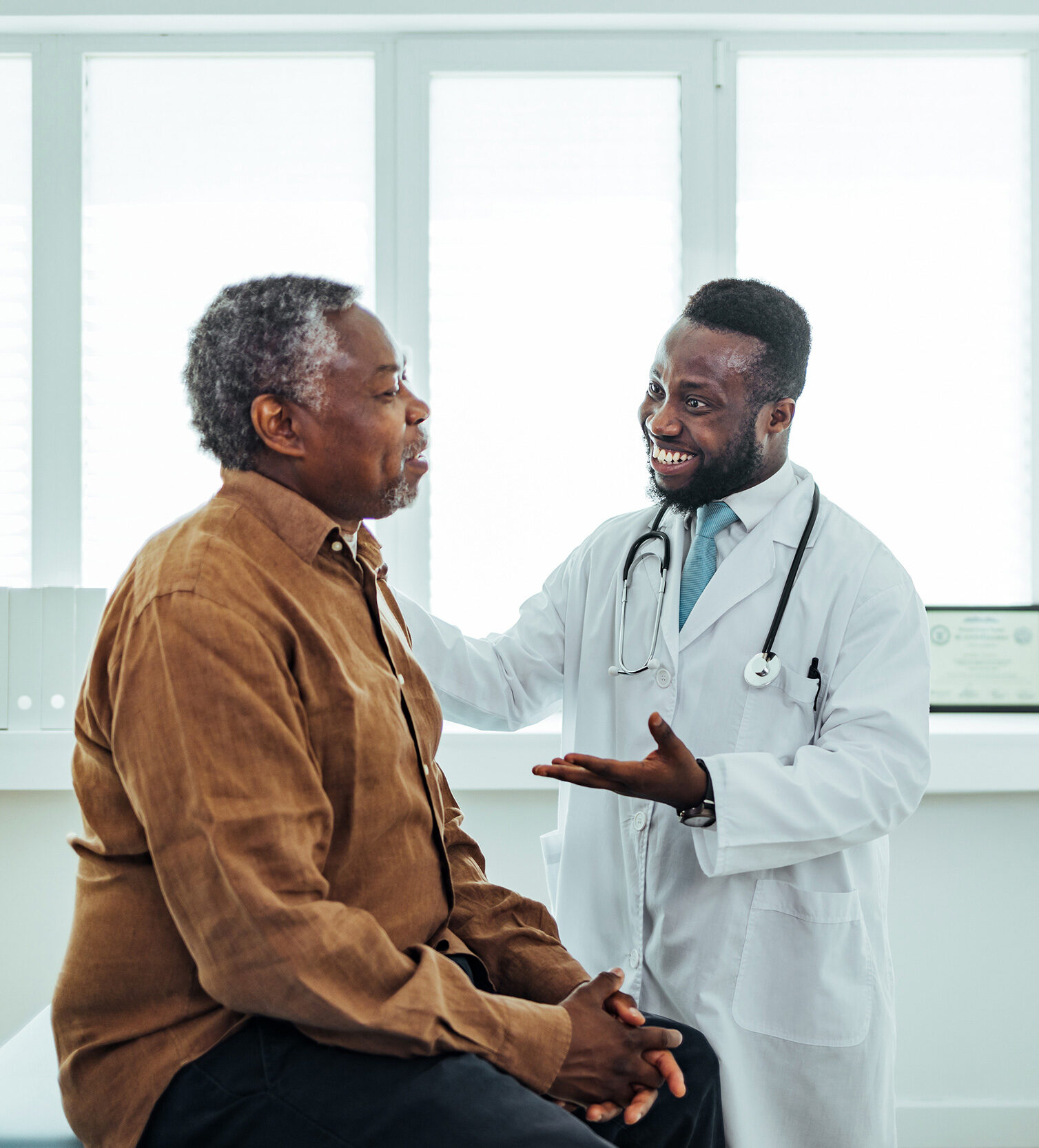 A doctor talks to his patient. The Social Security Disability lawyers at Troutman & Troutman serve Owasso and the entire Tulsa area.